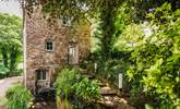 Ancient granite steps lead to the traditional door of this historic property. - Thumbnail Image