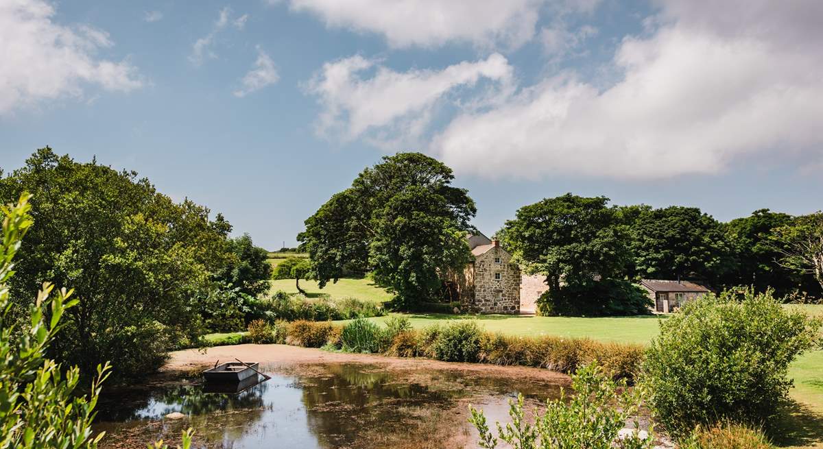 An organic pond in a tranquil spot within the beautiful enclosed gardens.