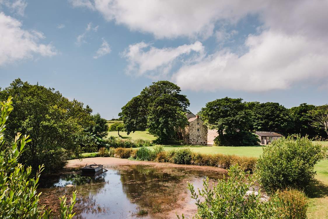 An organic pond in a tranquil spot within the beautiful enclosed gardens.