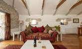 Sit back, pour a glass of wine and relax on the elegant sofas. - Thumbnail Image