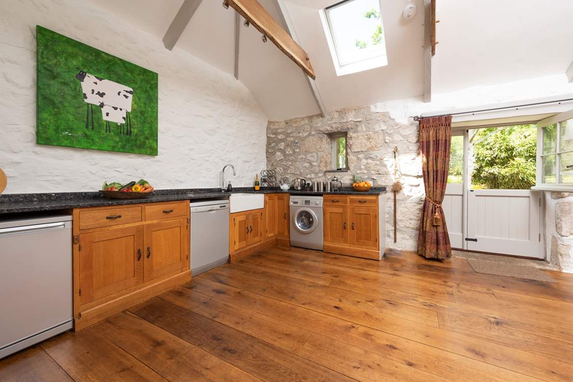 The bespoke kitchen is fully equipped to cook up a feast.