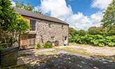 Welcome to Roskennals Granary, a lovingly restored reverse level Grade II Listed granite cottage nestled in natural beauty. - Thumbnail Image