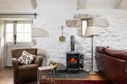 Light the sweet wood-burner on chillier evenings.