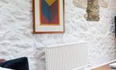 Modern art adds charm to the historic cottage. - Thumbnail Image