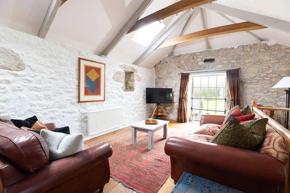 Gather round and share the day's adventures on the sink into sofas.