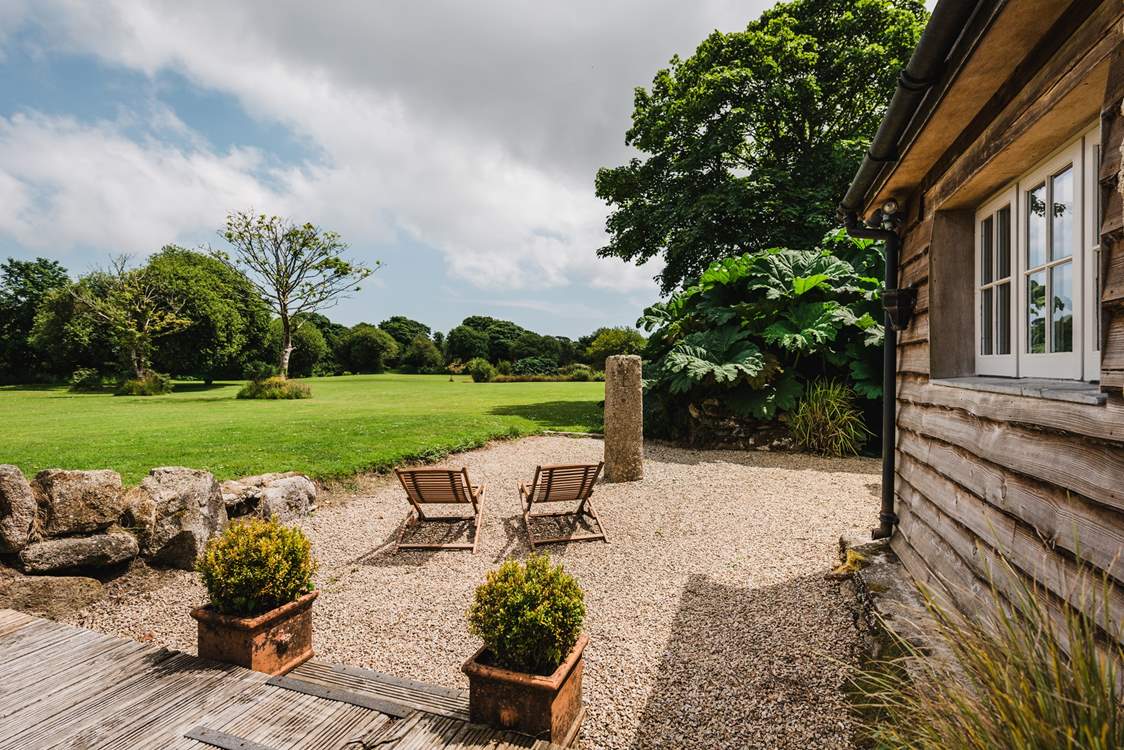 Sit back and unwind, you are surrounded by native plants and towering trees.