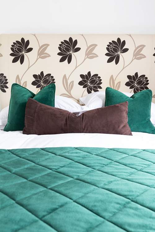 Luxury linens adorn the king-size bed.