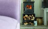 The sweet wood-burner fills this cosy cottage with warmth. - Thumbnail Image