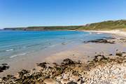 This is Sennen Cove with its turquoise waters and white sand, the perfect place to spend the day.
