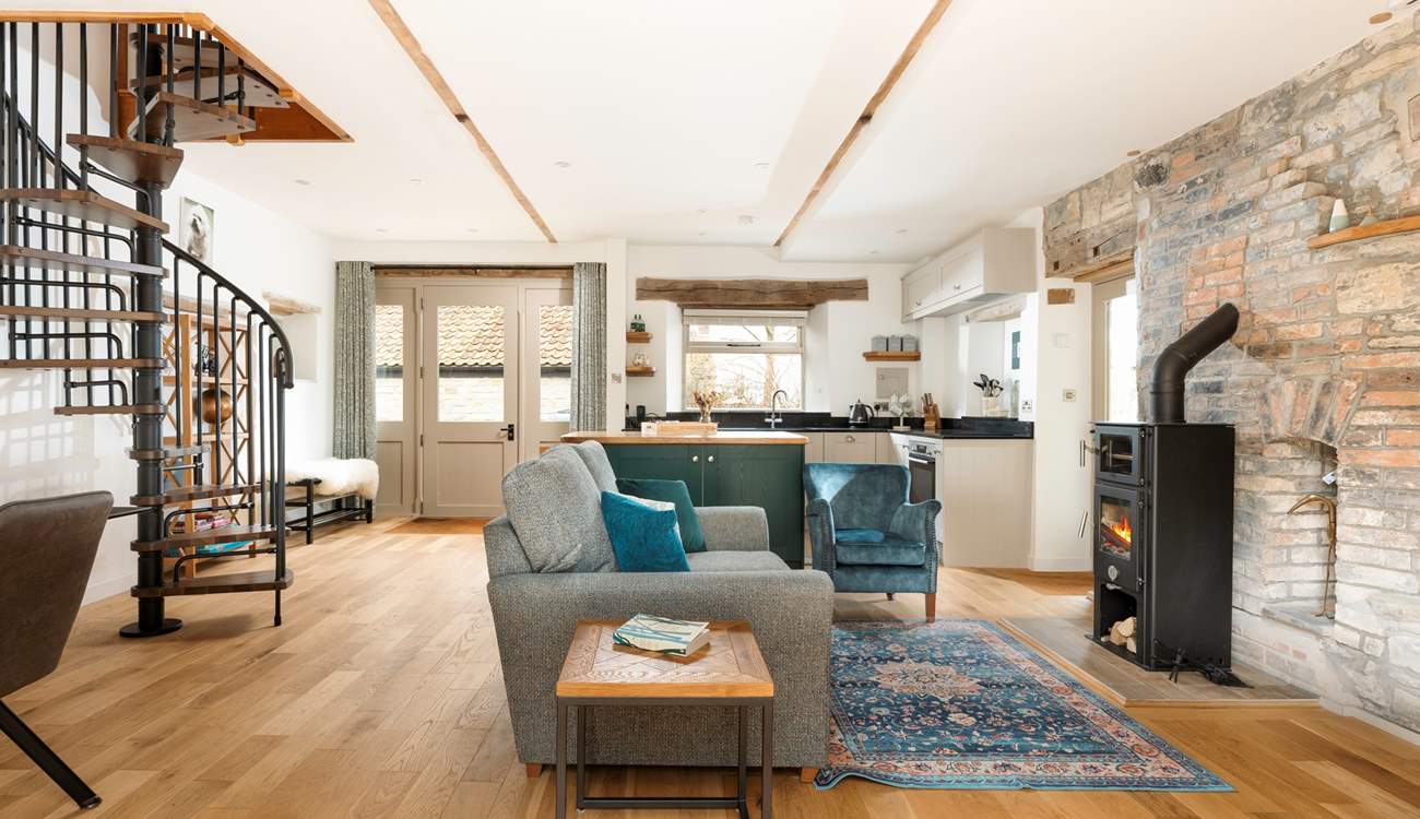 The spiral staircase leads up to Bedroom 2.