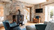 Fire up the Chilli Penguin log-burner with cute oven section at the top.