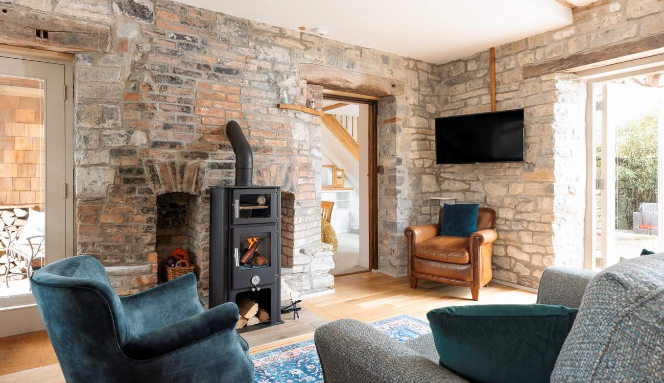 Fire up the Chilli Penguin log-burner with cute oven section at the top.