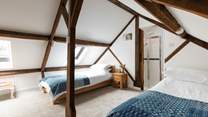 Head up the spiral staircase and find yourself in Bedroom 2.