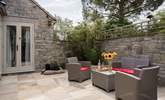 Sit out and enjoy time together in the sunshine. - Thumbnail Image