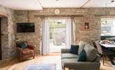 The doors out to the patio let in a welcome breeze on warmer days... - Thumbnail Image