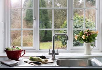 Who minds working in a kitchen with a view like that.