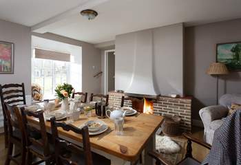 Through to the dining-room with its own roaring fire.