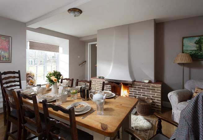 Through to the dining-room with its own roaring fire.