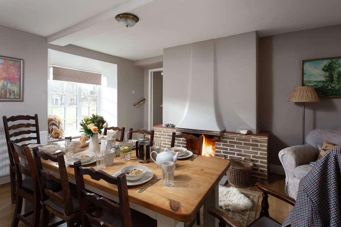 Through to the dining-room with its own roaring fire.