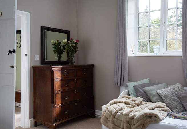 The day bed is great for those quiet moments reading a good book.