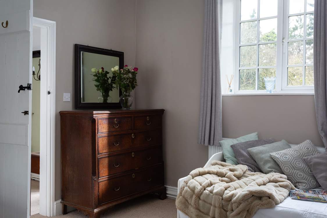 The day bed is great for those quiet moments reading a good book.