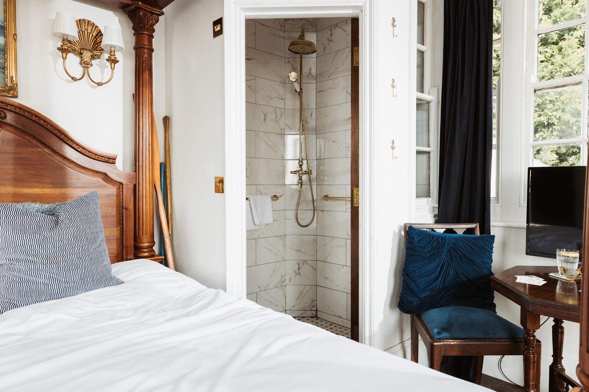 The shower occupies a separate room at the back of the cabin.  