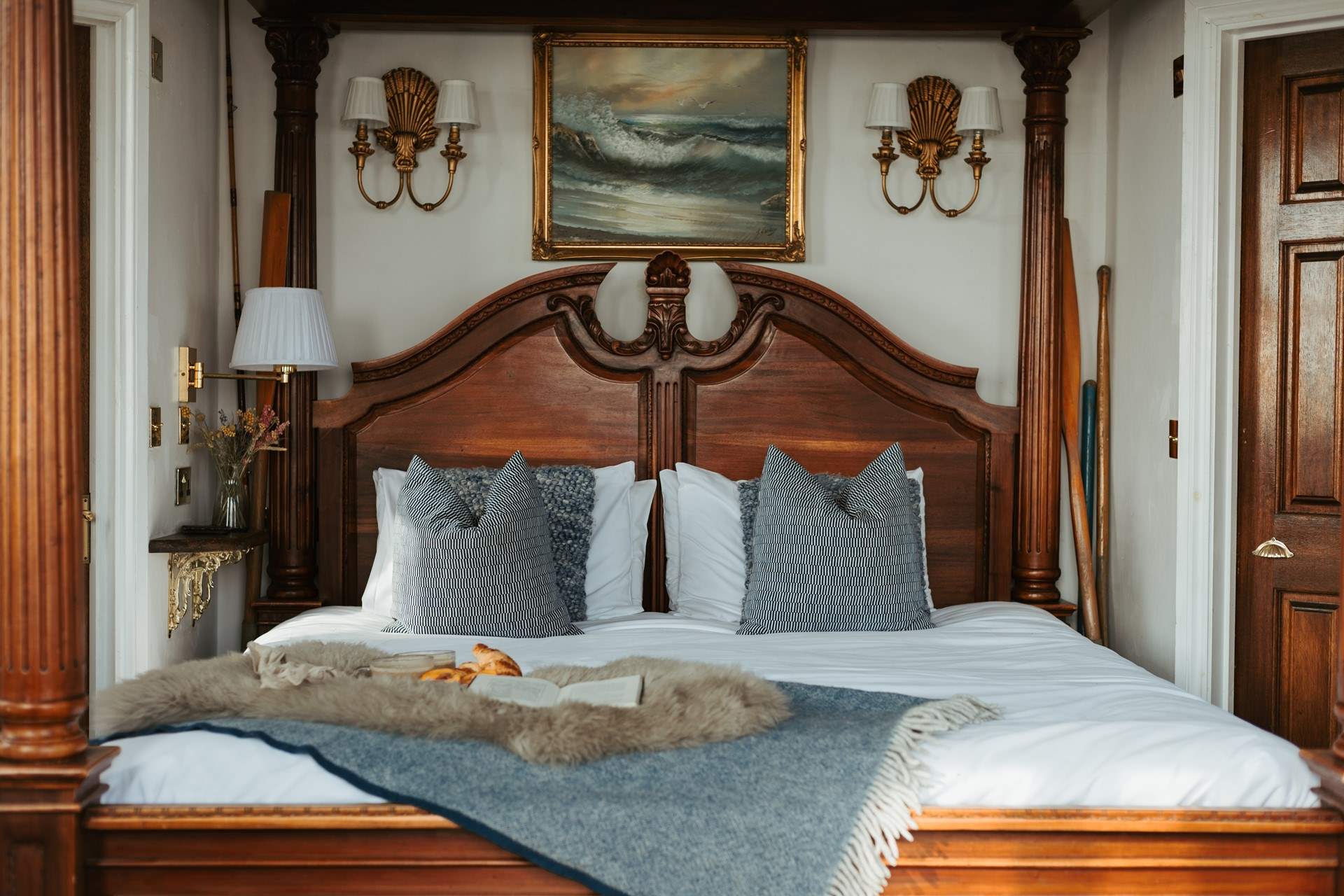 The four-poster super-king bed is the perfect place to unwind in blissful comfort. 