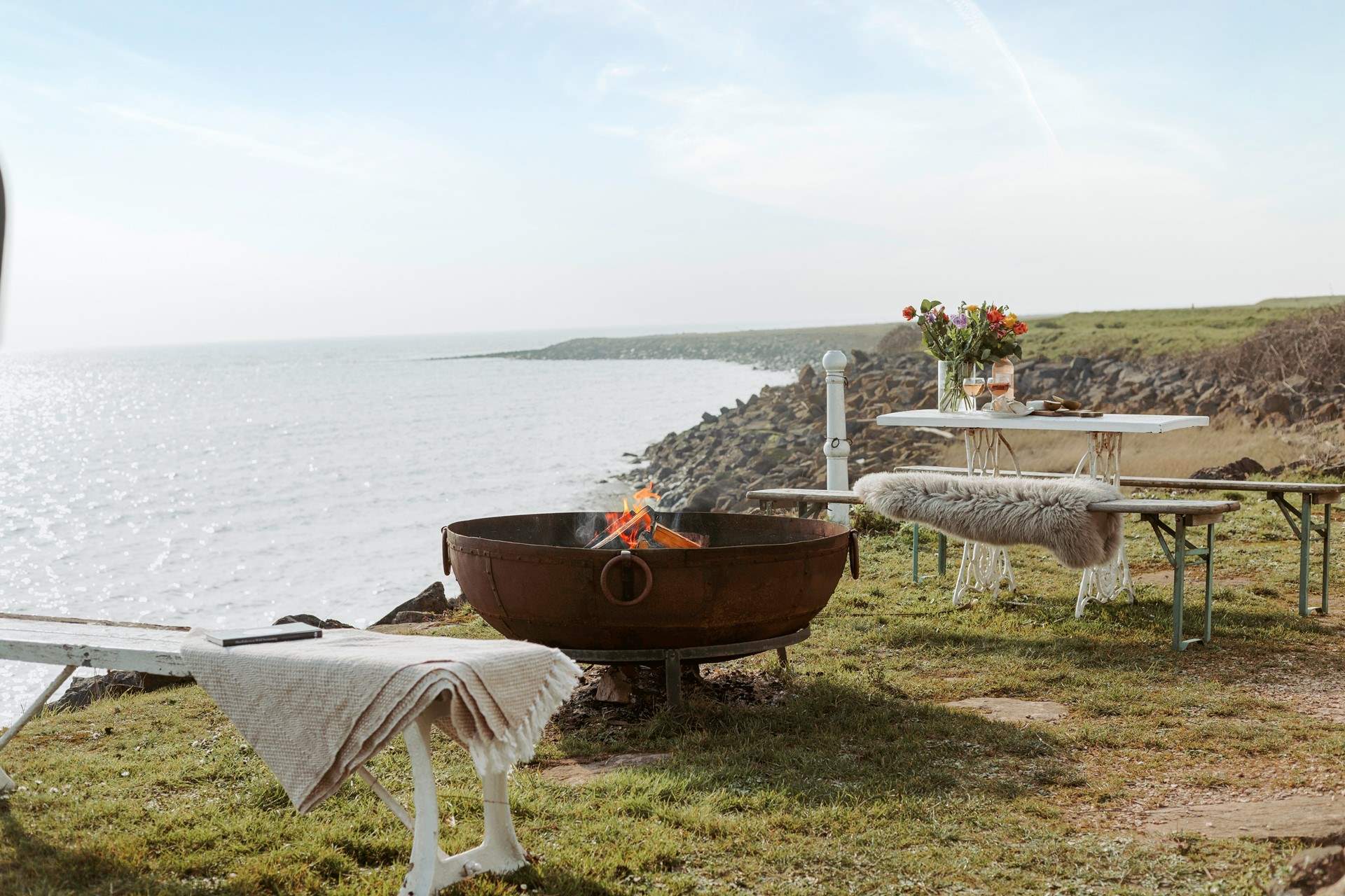 When dusk falls, light the fire pit and toast marshmallows under a starlit sky.