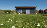 The garden cabin is there to enjoy and appreciate the outstanding views of the countryside and the sea in the distance.  Spend the evening watching the sun fade away. - Thumbnail Image