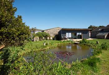 The garden cabin is situated in the grounds next to an organic pond. This is the perfect spot to watch the sun go down with a glass of bubbles.