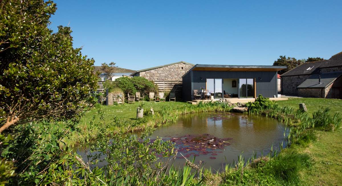 The garden cabin is situated in the grounds next to an organic pond. This is the perfect spot to watch the sun go down with a glass of bubbles.