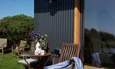 Share some holiday memories in front of the garden cabin. - Thumbnail Image
