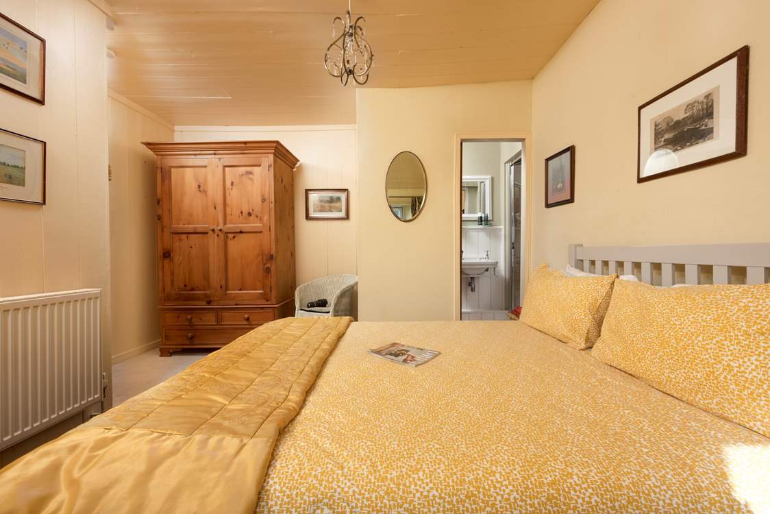 The principal bedroom boasts charm and character and an en suite shower-room.