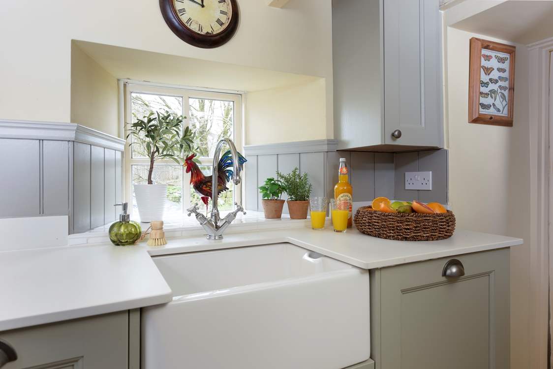 A huge butler sink in keeping with this charming cottage.