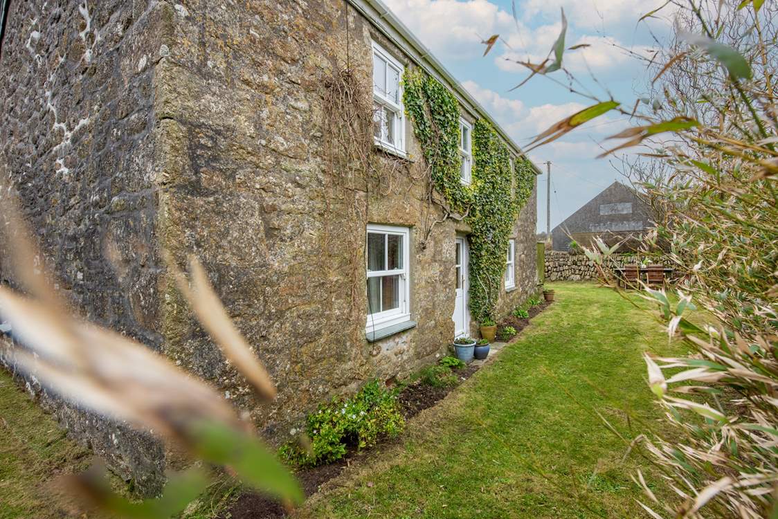 Step outside into the beautiful garden.