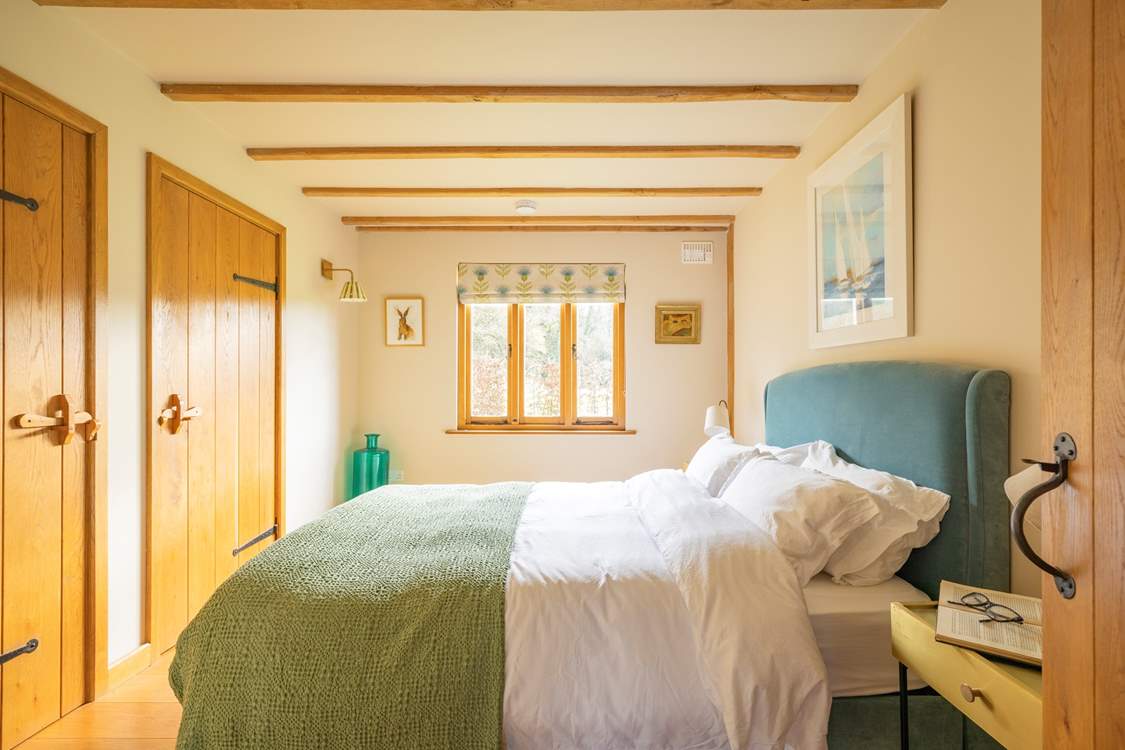 The two king-size bedrooms are tucked away towards the back of the barn.