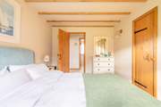 Bedroom 2 is adjacent to a spacious wet-room.