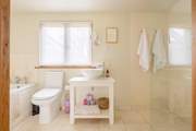 With walk-in shower.