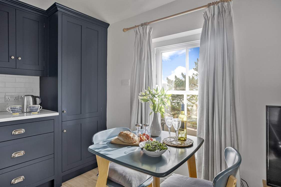 Linger over leisurely holiday meals at the sweet dining-table.