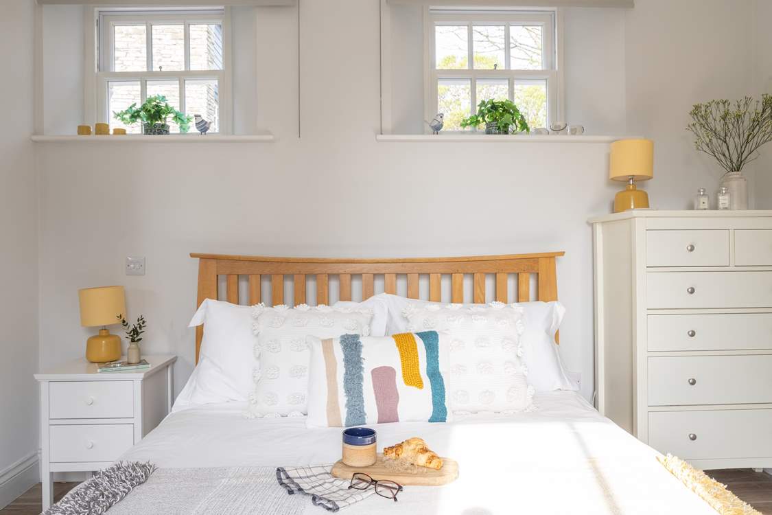 The king-size bed ensures a blissful night's sleep.