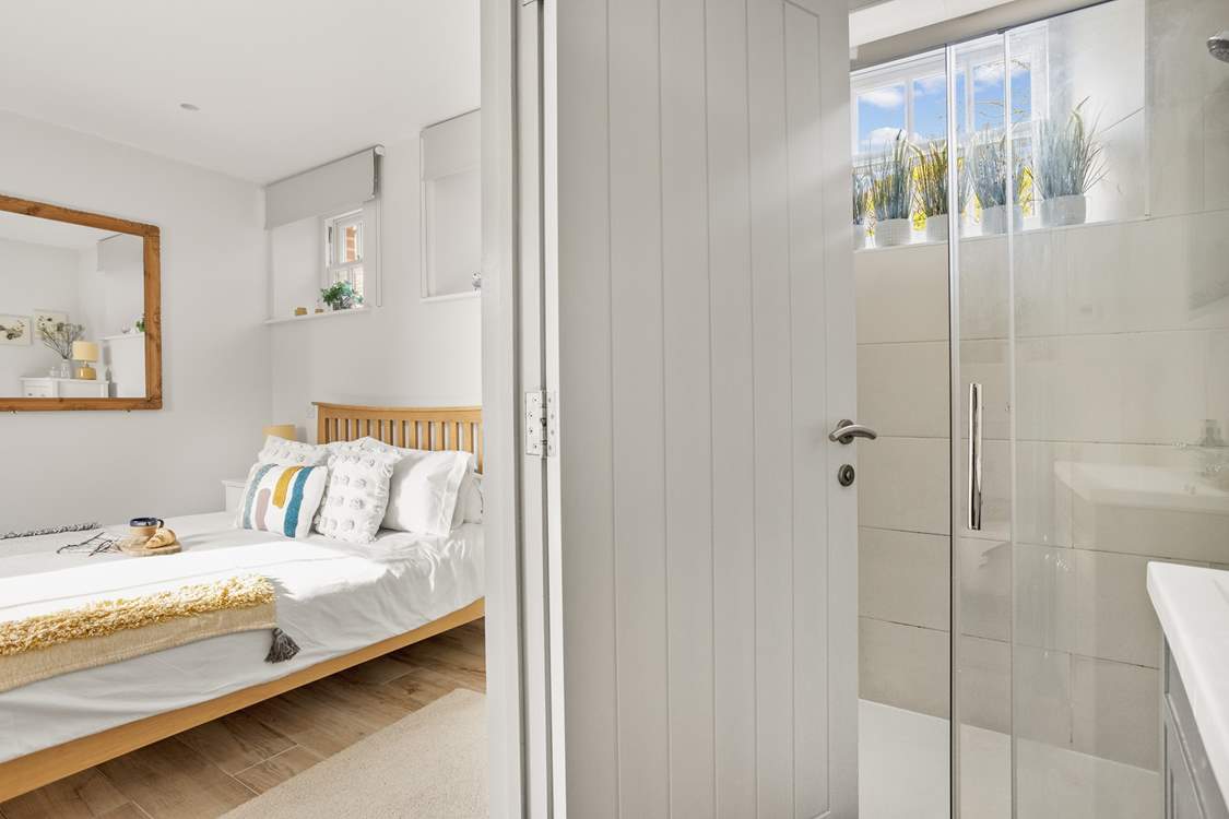 The bedroom has a handy en suite shower-room.