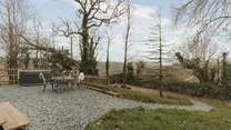Wander the meandering path to the fire-pit area. 
