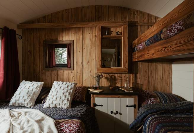 The clever design of the bedroom allows for four guests to sleep peacefully. 