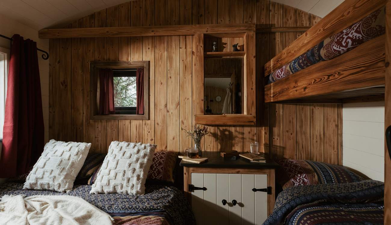 The clever design of the bedroom allows for four guests to sleep peacefully. 