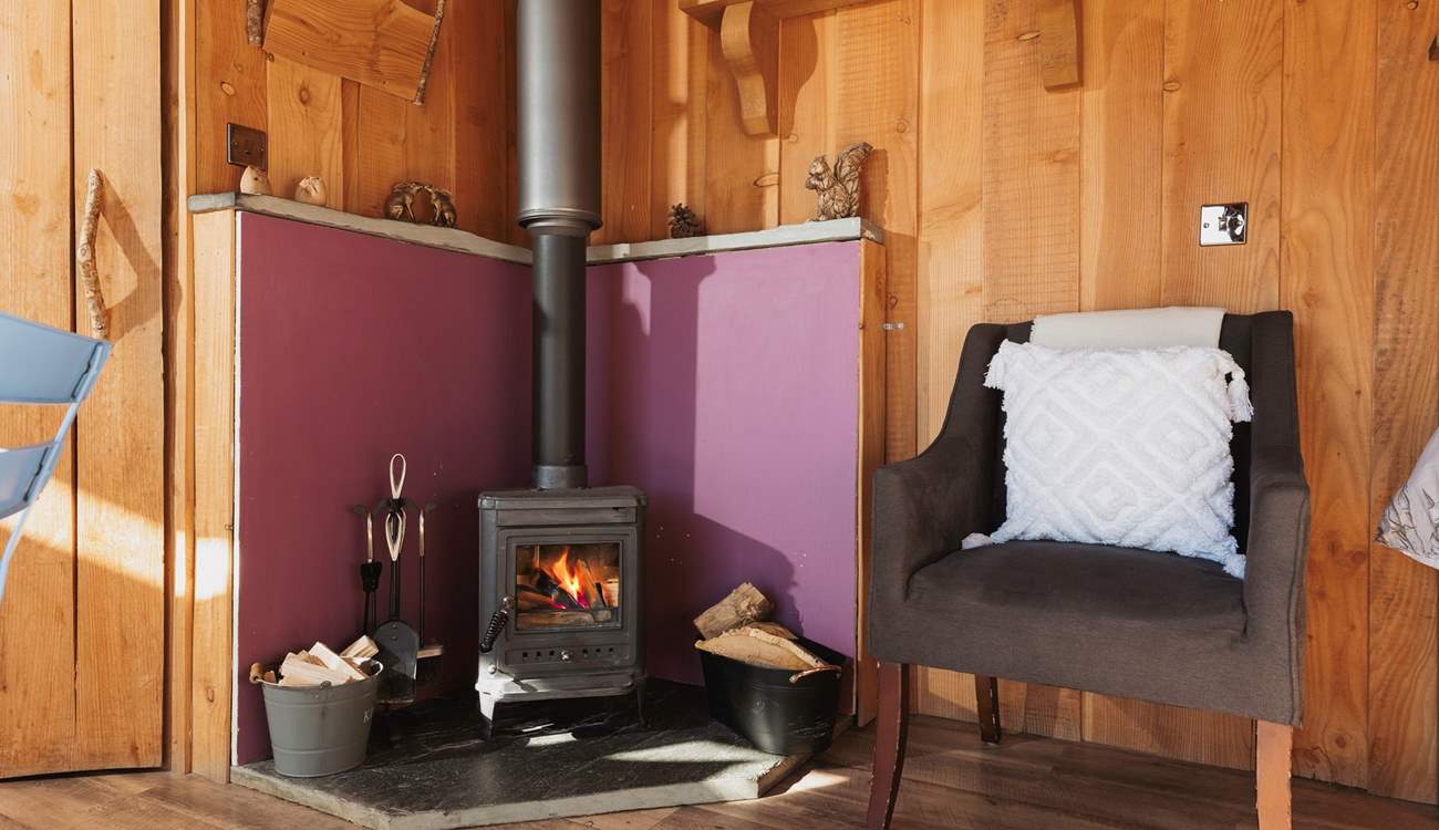 Cosy up by the wood-burner after a day of exploring. 