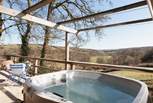 Or unwind in the bubbling hot tub.