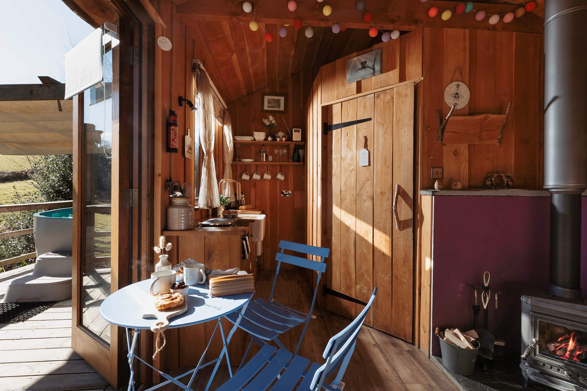 The warm wooden interiors match the tree-top setting.