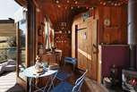 The warm wooden interiors match the tree-top setting.