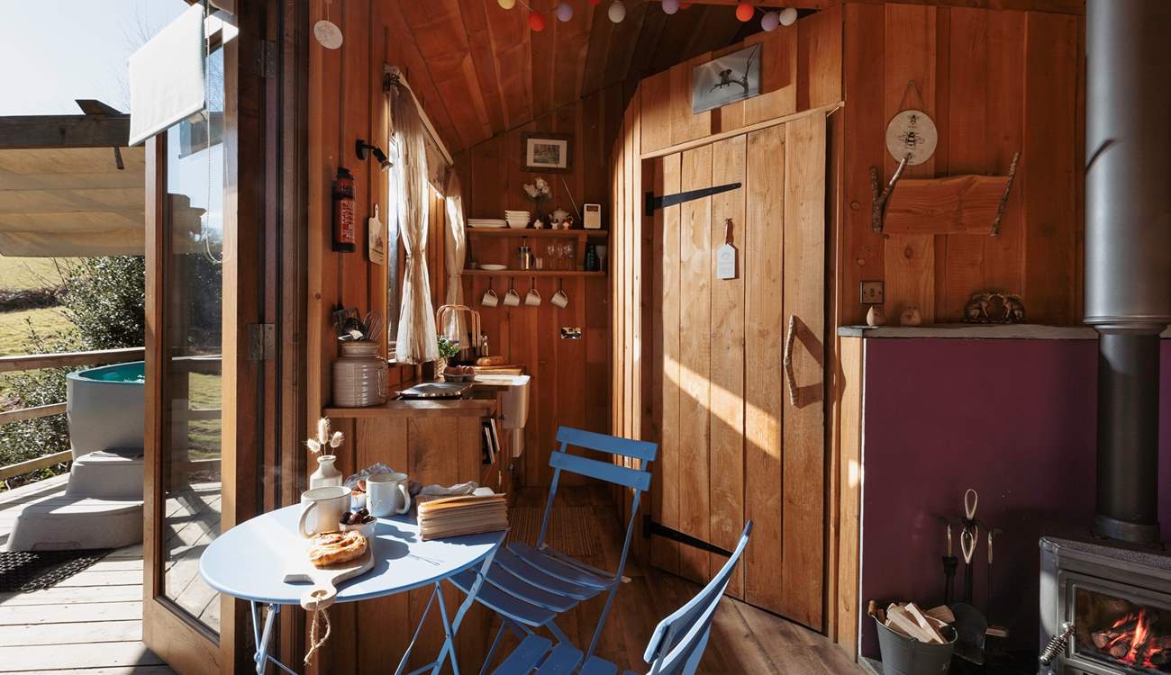 The warm wooden interiors match the tree-top setting.