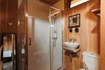 The shower-room is complete with a shower, wash basin and WC. 